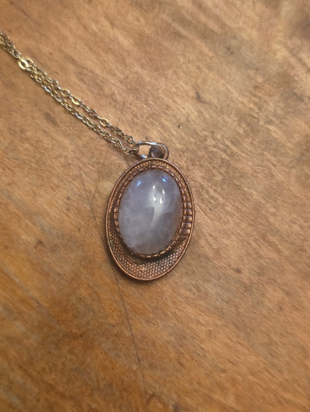 Tan Oval Resin Frame With Moonstone? Center On A Gold Tone Chain Necklace